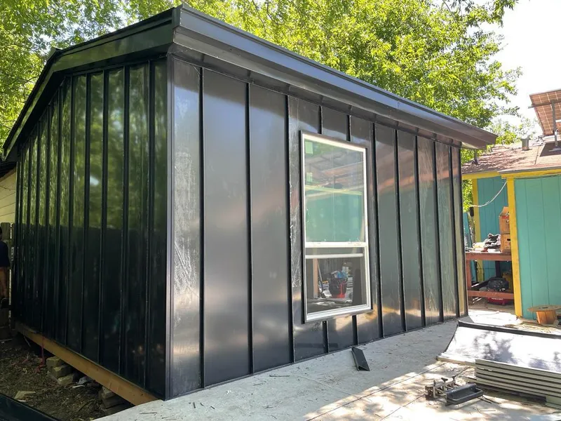 Black standing seam metal wall panels for Roof Inspection in Skokie